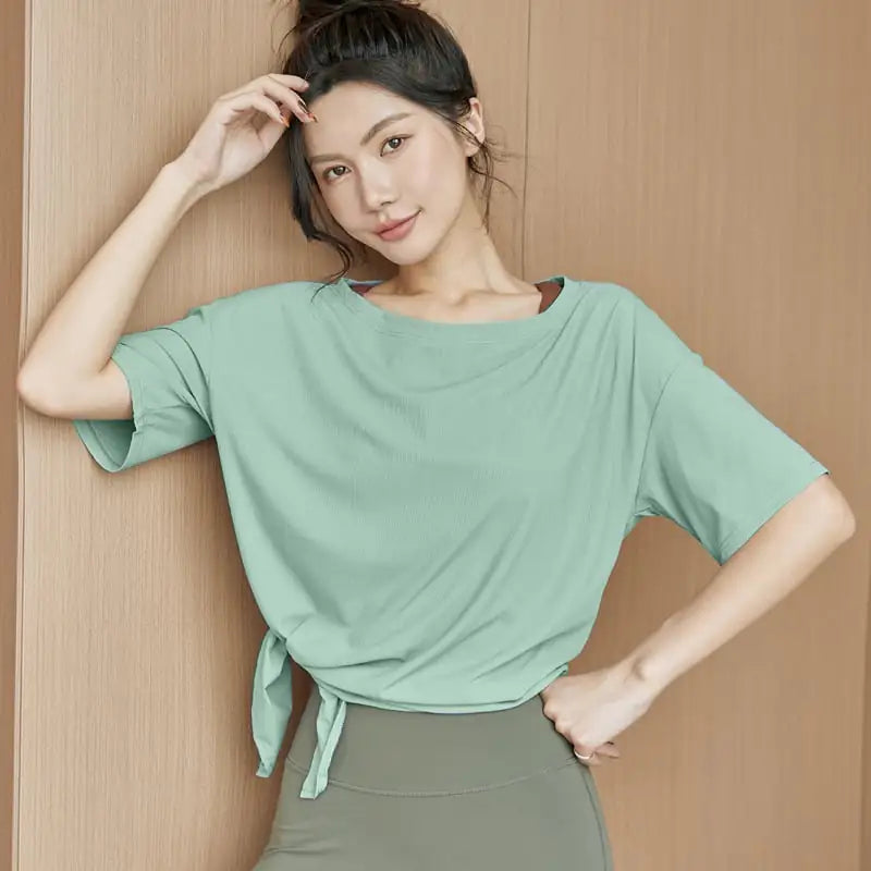 T-shirt de sport ample à manches courtes pour femme