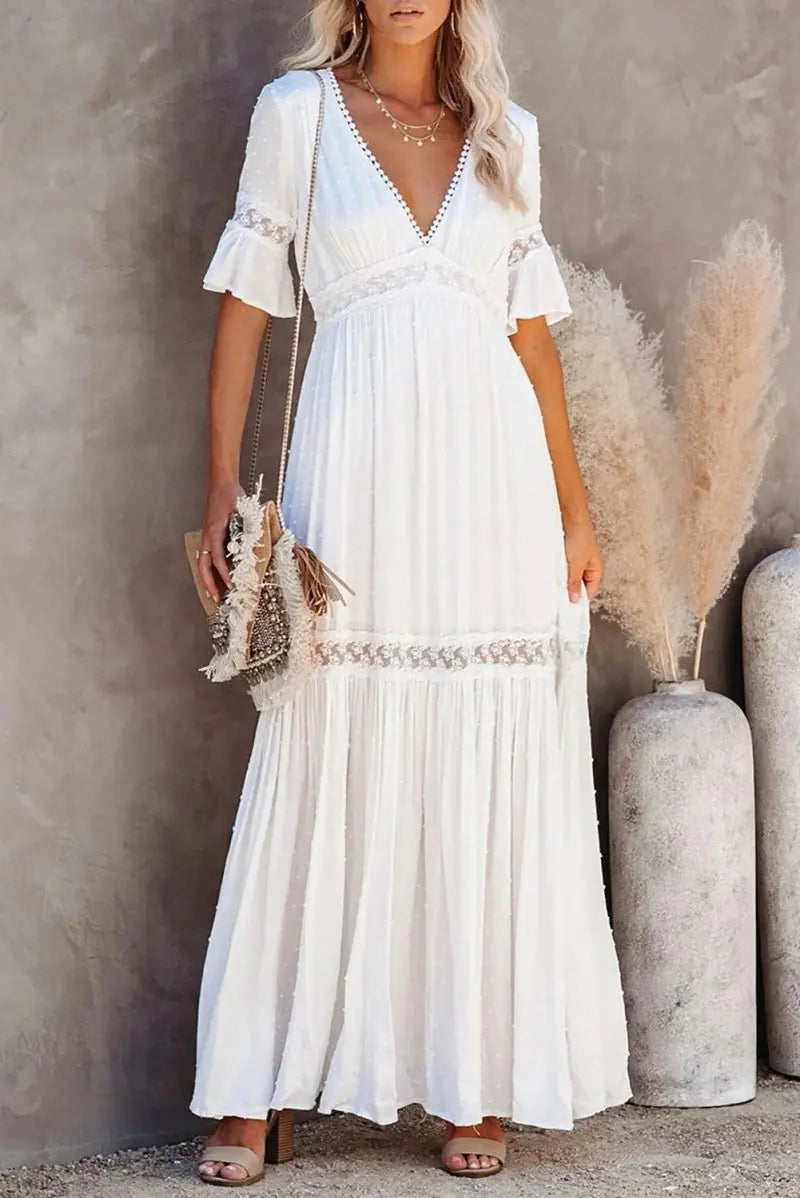 Robe longue en dentelle à col en V