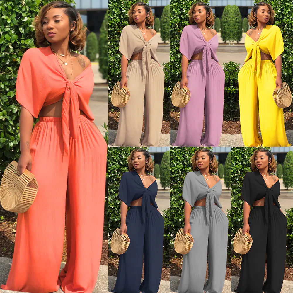 Ensemble deux pièces à manches courtes et décolleté en V profond avec pantalon large