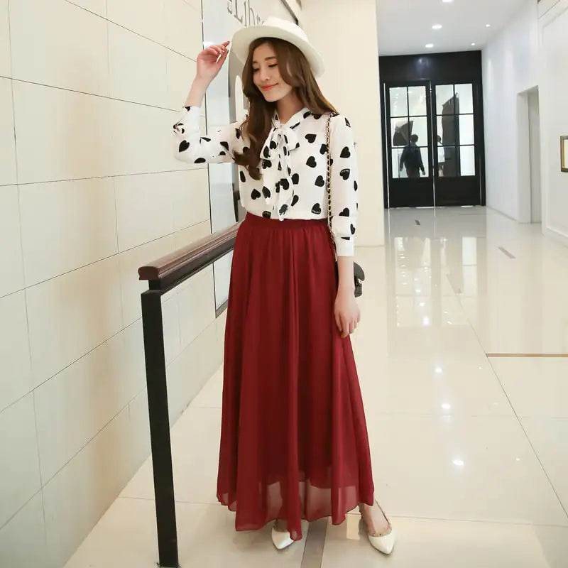 Jupe mi-longue taille haute en mousseline de soie