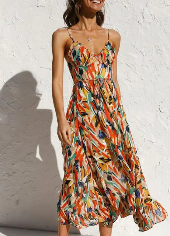 Robe mi-longue colorée avec ourlet à volants
