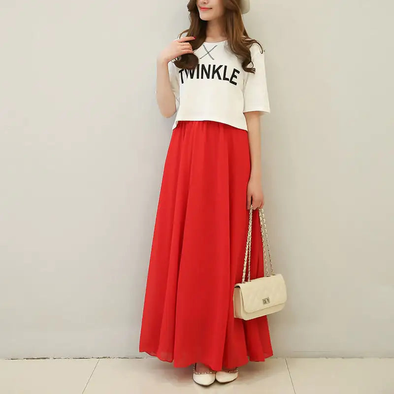 Jupe mi-longue taille haute en mousseline de soie