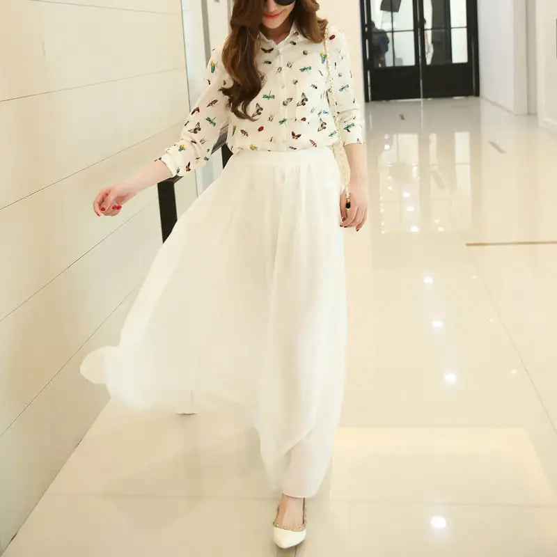 Jupe mi-longue taille haute en mousseline de soie