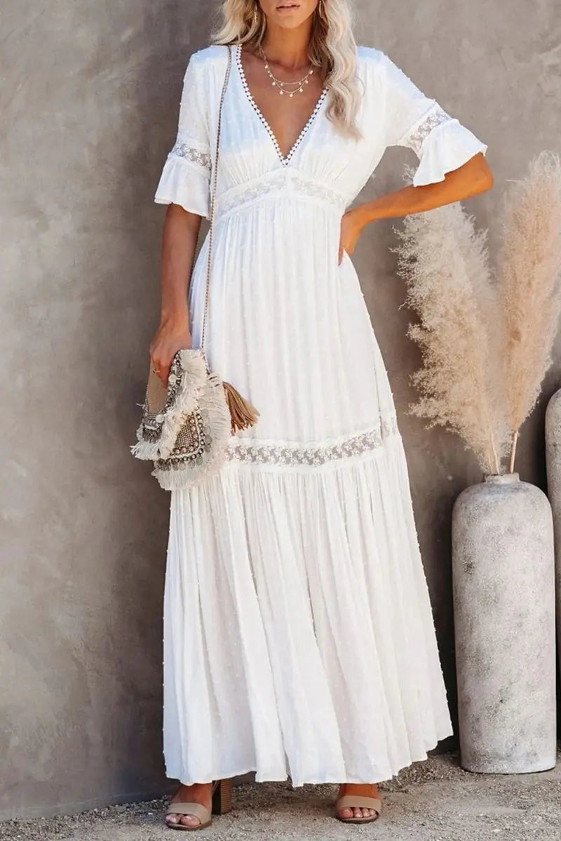 Robe longue en dentelle à col en V