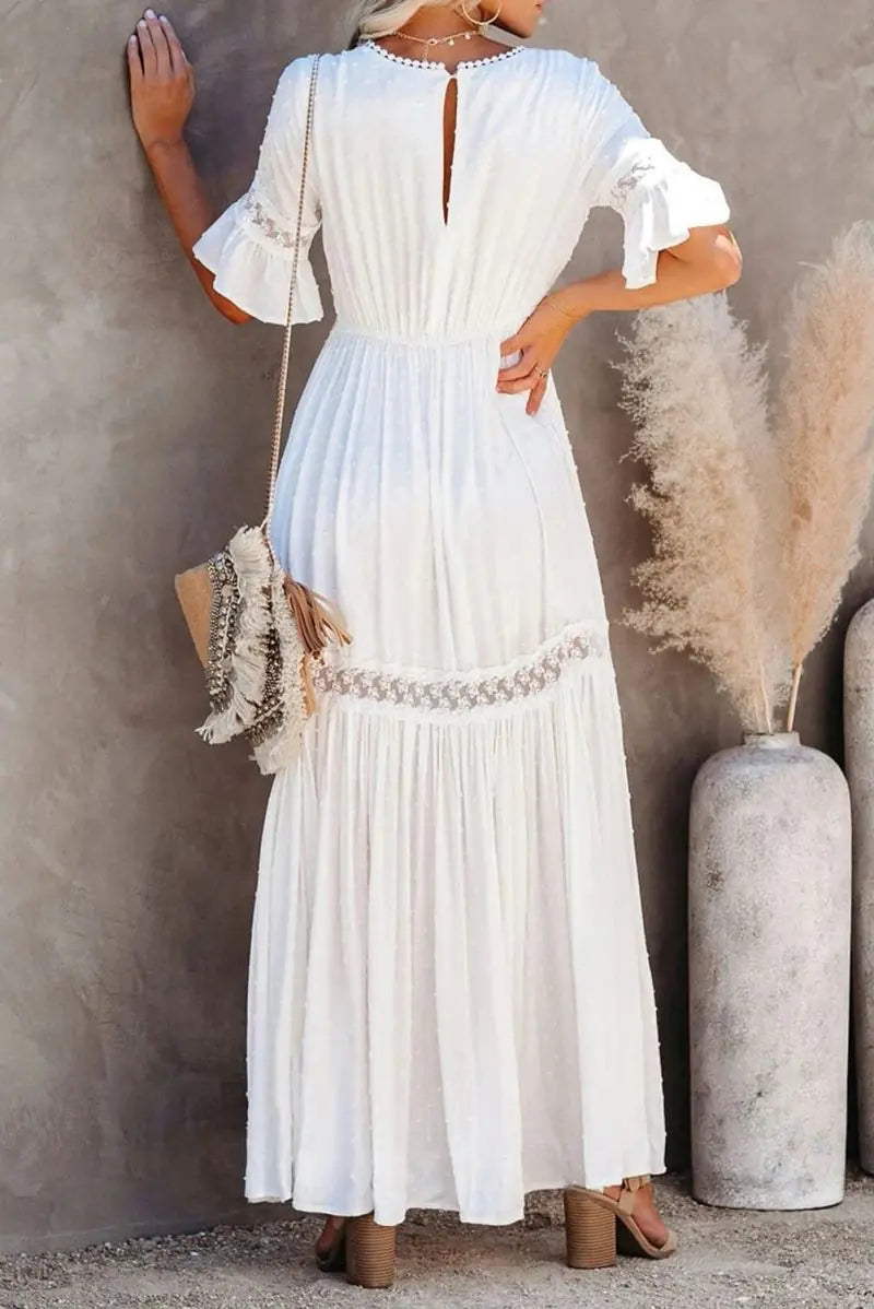 Robe longue en dentelle à col en V